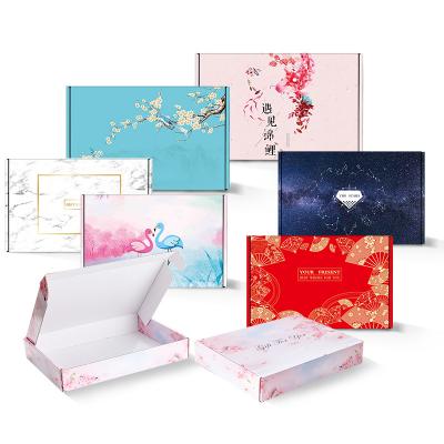 China Recycled Materials Customized Folding Corrugated Paper Box Customized Color Print Logo Packaging Clothing Wholesale Messenger Aircraft Box for sale