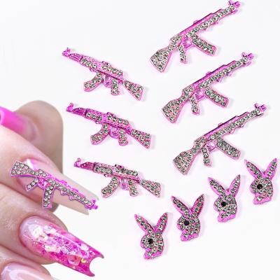 China America 2023 New Design Alloy 3D GUn Shape Nail Art Decorations Luxury Punk Alloy Accessories Rhinestones Gun Nail Charms for sale