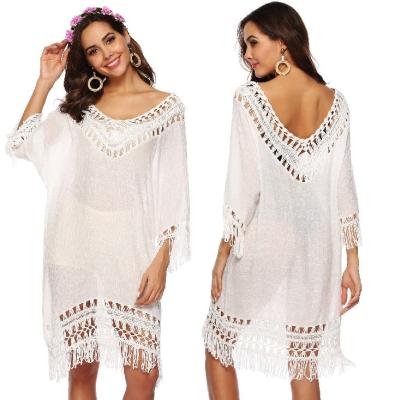 China Breathable Deep V Neck Hollow Out Three Quarter Sleeve Tassel Spliced Irregular Crochet Swimsuit Beach Cover Up Beachwear Woman Dress for sale