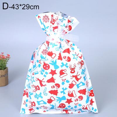 China Hot Selling Updated Desgin Colorful Plastic Xmas Colorful Customized Christmas Gift Bags In Bulk for sale