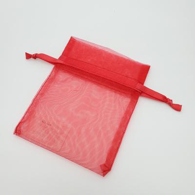 China Silk Screen Color Smart Simple Running Gift Organza Gift Packaging Pouch Drawstring Bag for sale