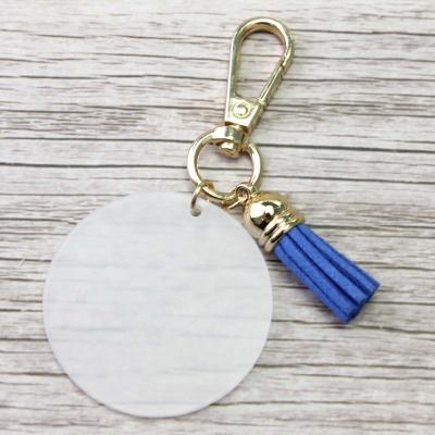 China Custom Clear Acrylic Velvet Buckskin Bohemia Monogram Tassel Keychains 43mm Tassel Disc Bag Pendants for sale