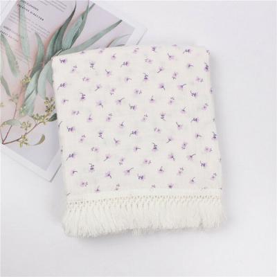 China Newborn Muslin Tassel Fringe Basics Portable Organic Cotton Nursery Wrap Blanket for sale