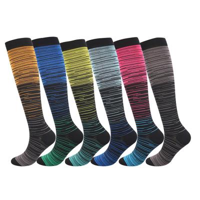 China 2021 New Product Sports Compression Socks Colorful Cycling Stockings Sports High Leg Running Long Knee High for sale