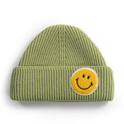 China COMMON New Products 2021 Women Colors Running Wholesale Knit Beanies With Logo Smiley Face Beanie for sale