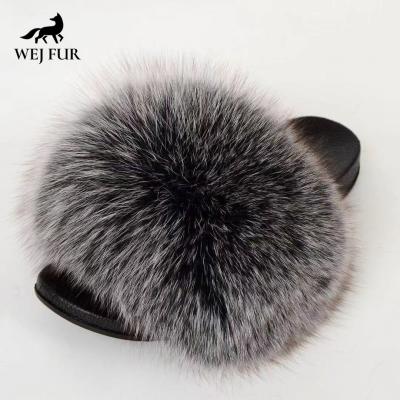 China Lightweight High Quality Furry Warm Plush Raccoon Fur Slippers Brown Gray Real Fluffy Fox Raccoon Fur Slipper For Women for sale