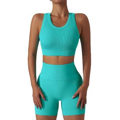 China Breathable Yoga Suit Shorts Two Piece Set For Fitness Running Quick Dry Exercise Yoga Set For Women Hip Lifting And Shockproof Seamless for sale