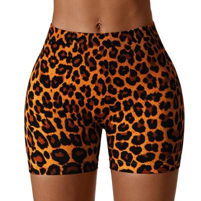 China Breathable Printed Seamless Yoga Shorts Tight Fit Fitness Pants Womens Hip Lifting High Waist Sports Shorts Sweat Light Release for sale