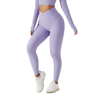 China Breathable plus size lady sexy sport wear high-waist legging tight hip lift running leggings women threaded fabric yoga pants with pocket for sale