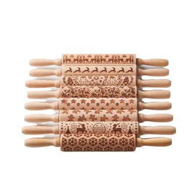 China Sustainable Factory direct gingerbread man deep embossed rolling pin cookie solid wood rolling pin a variety of patterns for sale