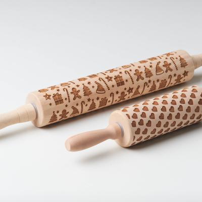 China Sustainable Custom Beech rolling pin Christmas style rolling pin, rolling pin with roller for sale