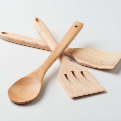 China Sustainable Wholesale Set Do Three-piece Lotus Tableware Wooden Spoon Shovel Peach Hole Fork Wooden Kitchen Supplies Travel Wood Lovely for sale