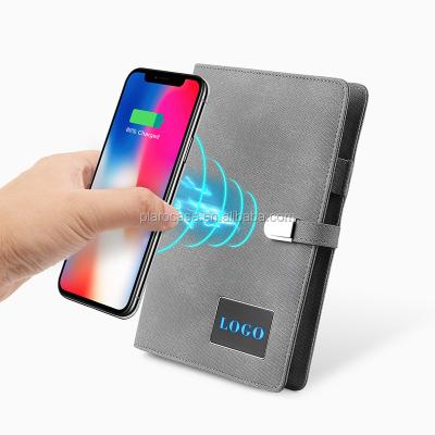 China A5 PU Leather Magnetic LED Logo Wireless Charging Notepad With Power Bank USB Lock for sale