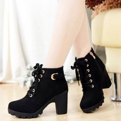 China 2021 autumn and winter women's waterproof leather boots new fashion thick high-heeled short thick heel boots cross-strap boots for sale