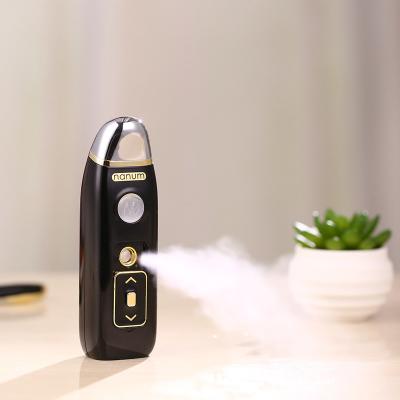 China Handheld Facial Jet Facial Humidifying Massager Beauty Massager Lighting Skin Tightening Beauty Ultrasonic Humidifier for sale