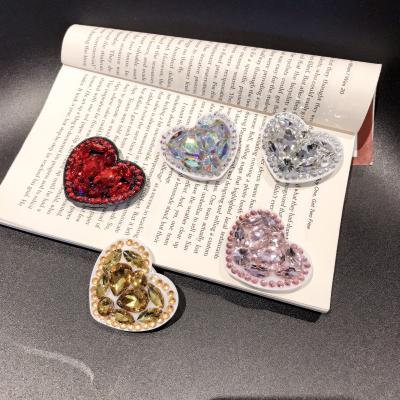 China 360 Degree Rotating Heart Design Diamond Stand Glitter Liquid Phone Holder Grip Stand For iPhone11pro X max XS max XR 8 plus for sale