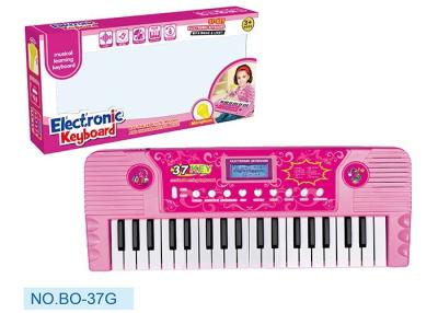 China Teclado de piano eletrônico das crianças cor-de-rosa com o microfone a pilhas à venda