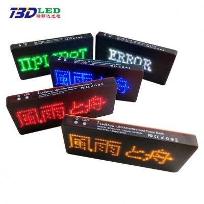 China LED Display 8000mAh Slim Power Bank With Luminous LED Display APP Change Text Custom Words Scrolling Messages Advertising LED Power Bank for sale