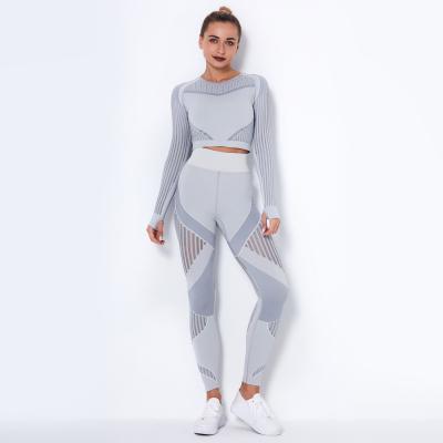 China 2020 Newest Fashion Mesh Striped Design High Waist Seamless Yoga Set Long Sleeve Yoga Set Women Fitness GYM Yoga Set Breathable Sportswear for sale