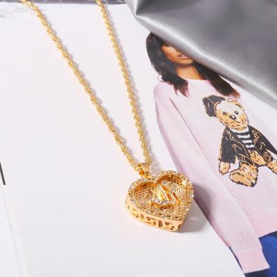 China CLASSIC Hollow Out Charm Gold Heart Necklace Shiny Zircon Stone Stone Fashion Girls Women Necklace for sale