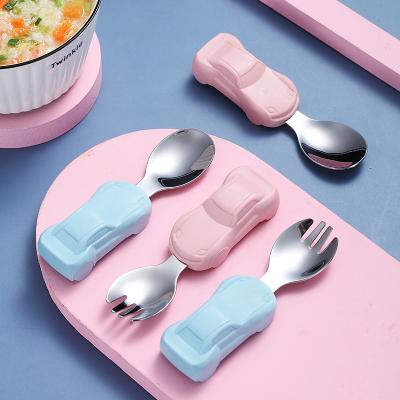 China 20 Viable Hot Selling Amazon Baby Learning To Eat Plastic Spoon Handle Kids Spoon 304 Stainless Steel Cutlery Baby Training Spoon for sale