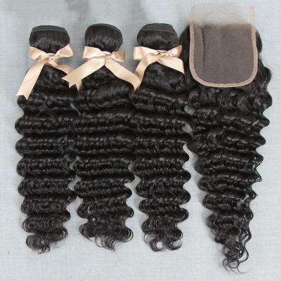 China Factory Wholesale Cuticle Aligned Deep Wave 10A Grade Peruvian Deep Wave Virgin Hair Curly Bundles With Closure for sale