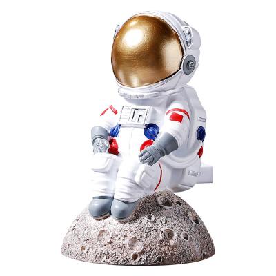 China Cute and creative bedroom TV cabinet living room ornaments resin astronaut resin handwork minimalist desktop ornaments for sale