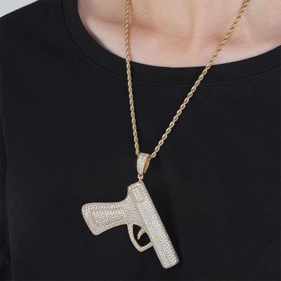 China Hiphop Newcomers Fashion Design Mens Gun Necklace Gold Plated Brass Zirconia Hip Hop Pendant for sale