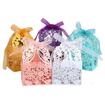 China Recycled Materials Hollow lace gift box packaging boutique holiday wedding party decoration bride and groom pink candy storage box for sale