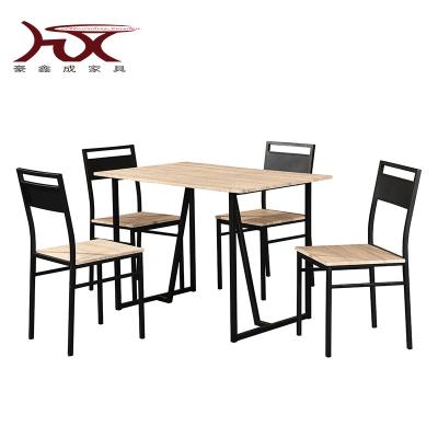 China Firmly 5 Pieces MDF Metal Top Dining Table Set Rectangular Table Dining Sets for sale