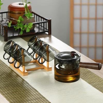 China Sustainable Kung Fu Glass Tea Cooking Pot Set Cooking Glass Teapot With Wooden Handle for sale