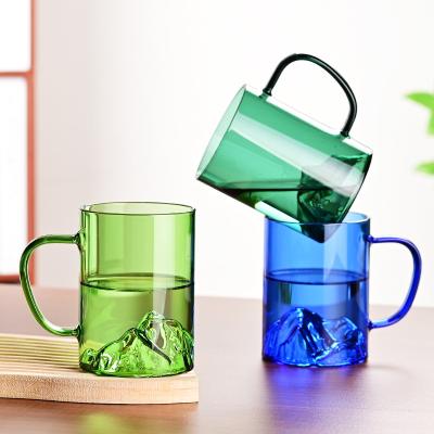 China Sustainable Wholesale High quality 400ml Mountain View glass tea cup with handle for sale