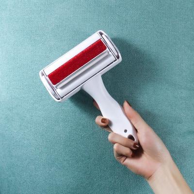 China Sustainable Self-cleaning Pet Hair Remover Roller Brush Deshedding Tool Pet Grooming Brush For Furniture Upholsters Clothing for sale