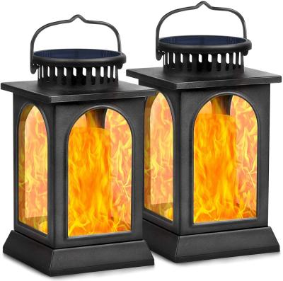 China Outdoor Solar Lights Flame Metal Lantern Flickering Heavy Duty Solar Powered Waterproof Umbrella Lights Patio Deck Yard Garden for sale