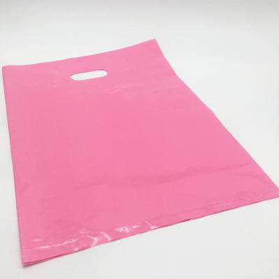 China Latest LDPE Printed Plastic Packaging Bag Die Cut Recyclable Handle Bag For Clothes for sale