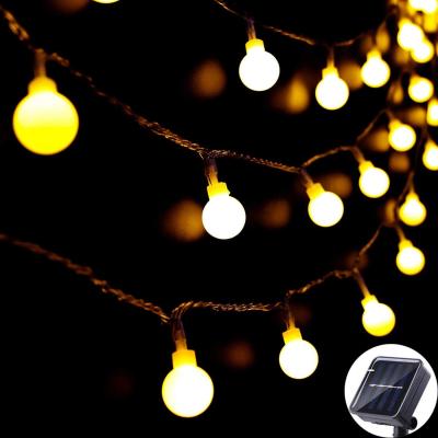 China Outdoor 60 LED Solar Lights, 8M/27Ft Solar Powered Garden String Fairy Lights, 8 Modes Waterproof Solar Powered Globe Lights for sale