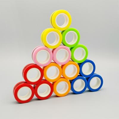 China Newest Hot Selling Plastic Cement Colorful Magnetic Rings Stir Toy Set Magnets Spinner Rings for sale