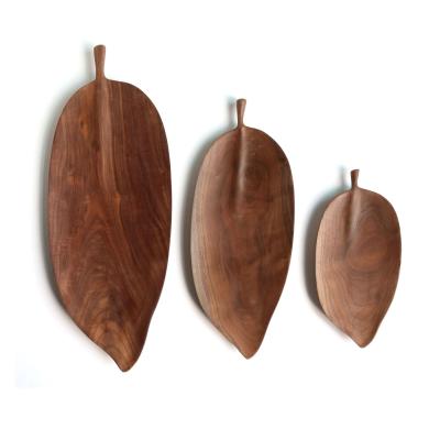 China Sustainable Hot Leaf Shaped Walnut Wood Dinner Dishes , Oval Wooden Dishes for sale