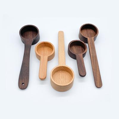 China Disposable factory supplies small 8g10g black walnut beech bean coffee bean measuring spoon wooden measuring cup beans for sale