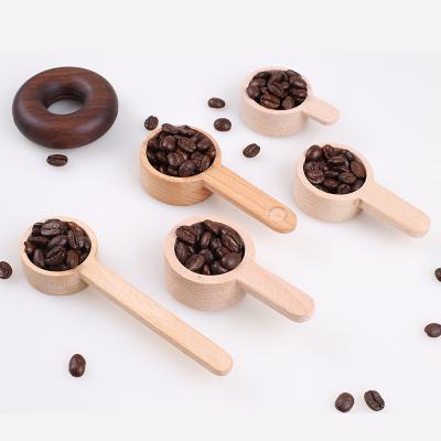 China Disposable factory supplies small 8g10g black walnut beech bean coffee bean measuring spoon wooden measuring cup beans for sale