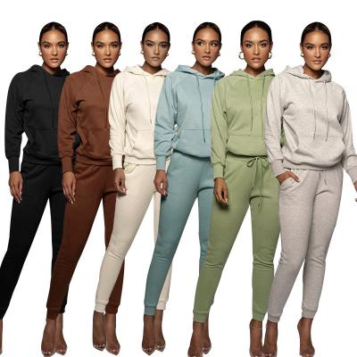 China Autumn QUICK DRY women long sleeve joggers sweatshirt with pocket suit sweatpants and pullover hoodie set for sale