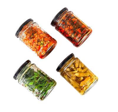 China Luxury Transparent Food Kitchen Storage Glass Jars Storage 500ml Round Glass Bottles Kitchen Glass Containers for sale