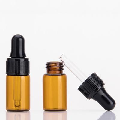 China Mini Essential Oil Glass Bottle 1ml Essential Oil Bottle Roller Cosmetic Clear Amber Bottle for sale