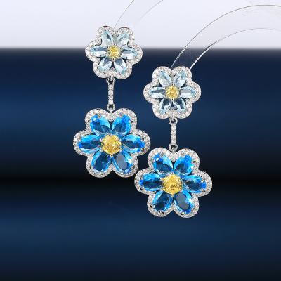 China Hot Selling Luxury Sunflower Zircon Rhinestone Material 2023 Drop Friendly High Quality Cubic Flower Earrings for sale