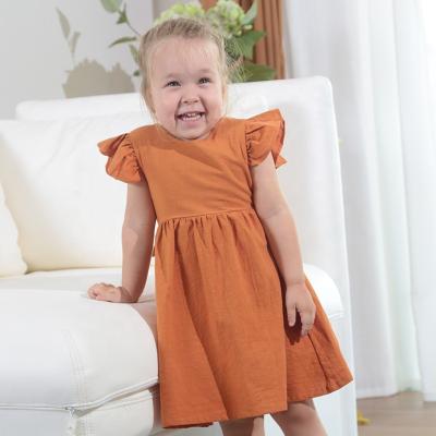 China Baby washable cotton dress summer girls solid color canvas child's skirt bow princess to border European and American children's skirt fluffy dress for sale