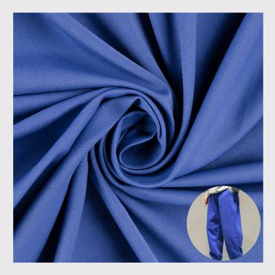 China Low MOQ Quick Dry Wicking Sports Wear Peaching 70D 30D Polyester Stretch Elastic Jacquard Knit Fabric for sale