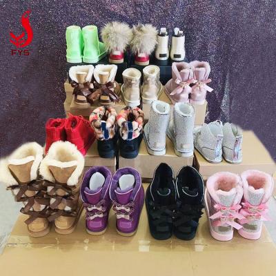 China Custom wholesale fashion trend logo womenwaterproof ankle sheepskin snow boot adult hairy fur boots for kids 2020 for sale