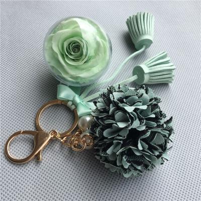 China Hanging Decoration Wholesale Preserved Roses Eternal Roses Flower Ball Key Chain Green Color Hot Selling for sale