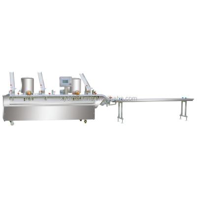 China Biscuit XYD-C one rows(3+2) multi-sandwich cream or jam machine,ice cream machine production line for sale