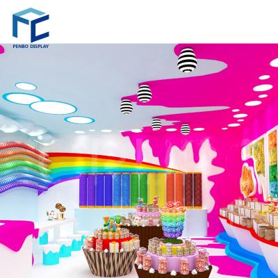 China Powder Coated Steel Amazing Sweet Shop Furniture Custom Colored Candy Store Lollipop Display Interior Design Candy Store Fixtures for sale